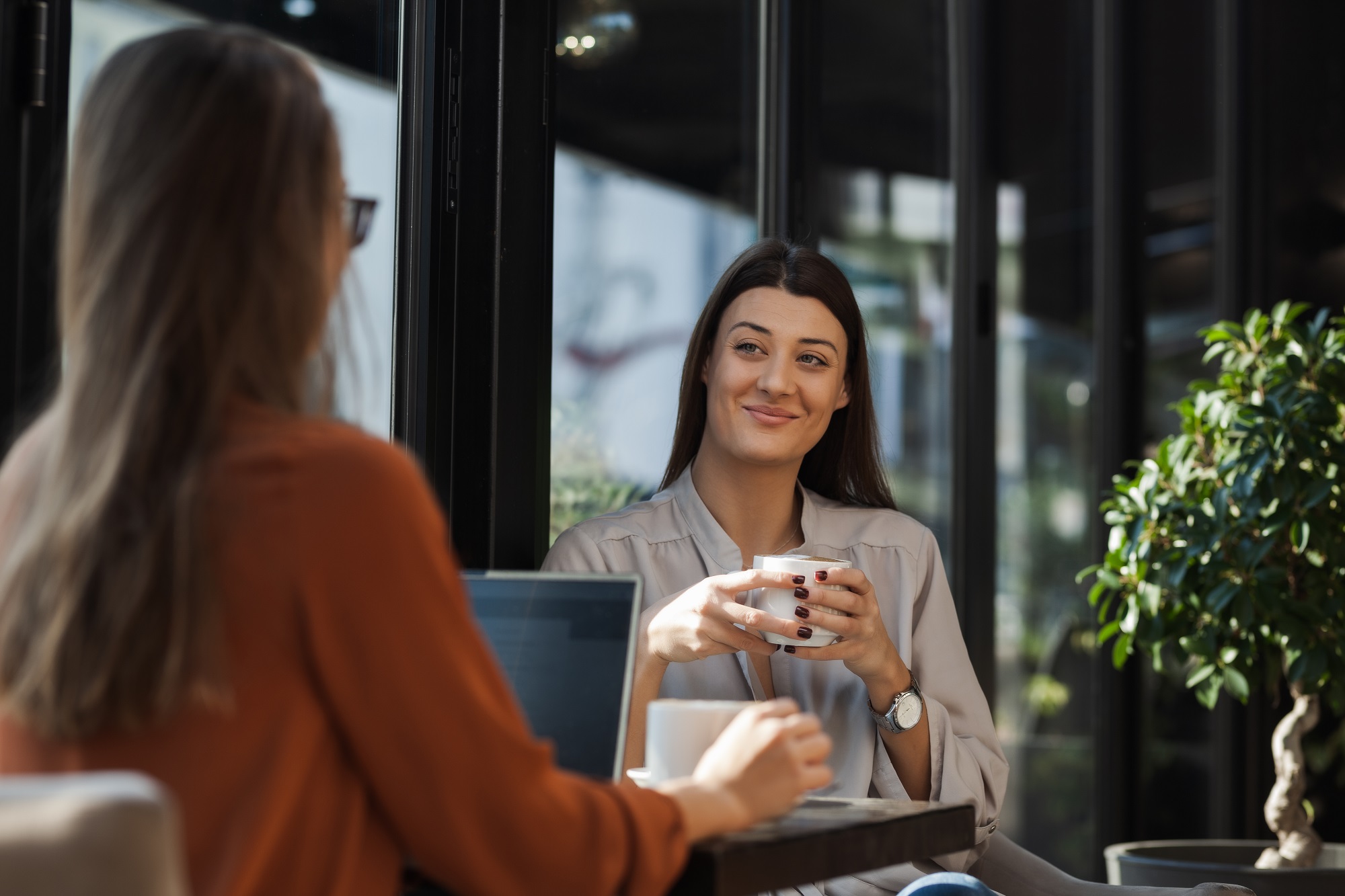 Two person in a cafe.