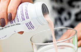 Ravintolisä Alzheimerin taudin hoitoon.