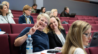 People in auditorium.