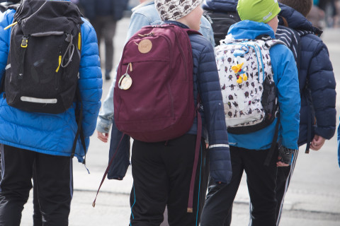 Childern with the backpacks.