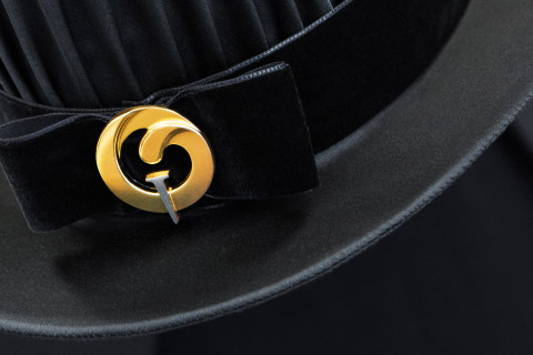 Doctoral hat with UEF emblem.