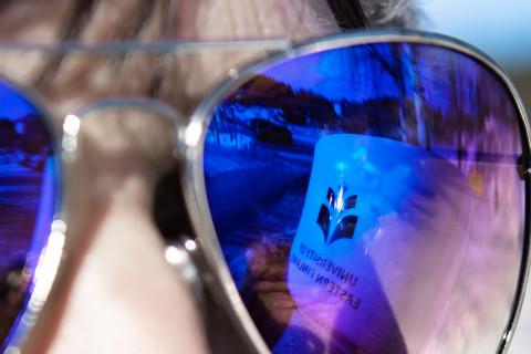 UEF reflection on sunglasses.