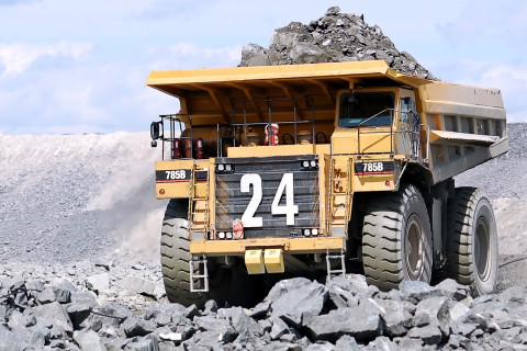 Mining dump truck on an open-pit mine.