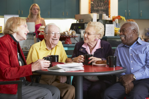 Group of elderly people having coffee.