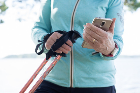 Mobile phone and poles for Nordic walking.
