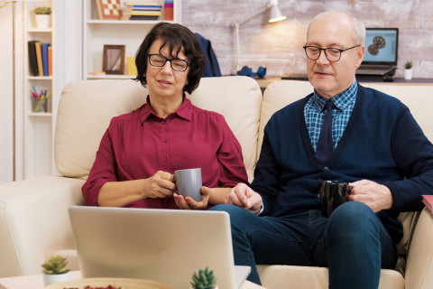 Old people with computer.
