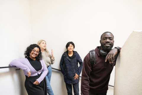 Student smiling in a line