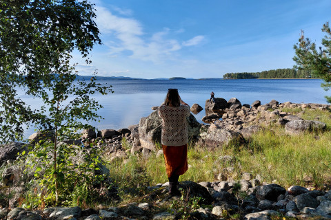 Two people on the shoreline.