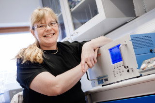 Marja Maljanen in laboratory.