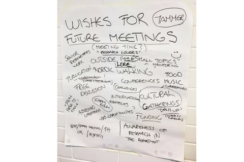 Hand written wishes for future meetings on a paper.