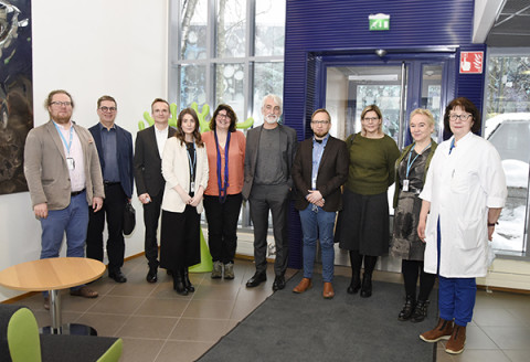 OECI:n auditointitiimi ja KYSin sekä Itä-SUomen yliopiston väkeä Kuopiossa helmikuussa 2022.