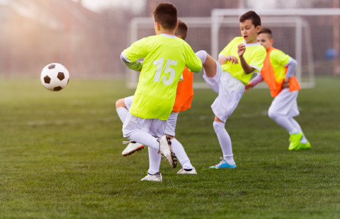 Children playing football