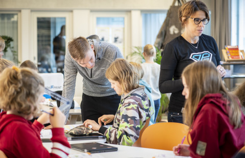 Students study in a multi-purpose classroom