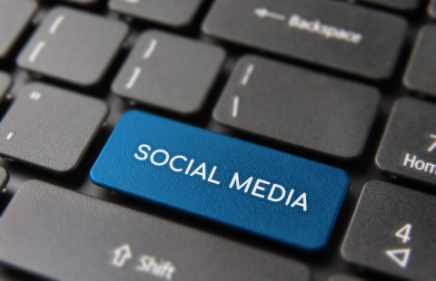 Social media button on computer keyboard