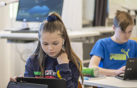 Pupils in classroom.