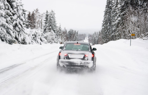 Car on a snowy road.