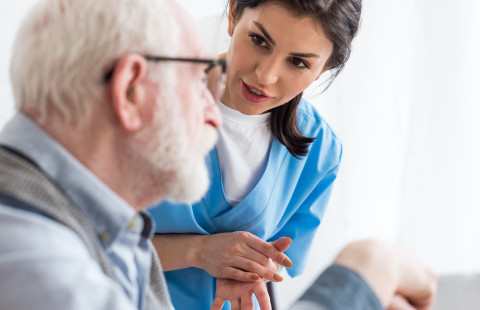 Nurse talking to patient
