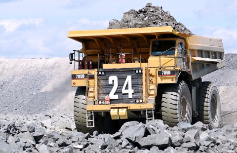 Mining dump truck on an open-pit mine.