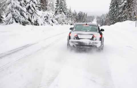 Car on a snowy road.