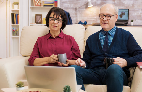 Old people with computer.