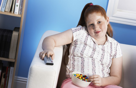 Child with remote control.