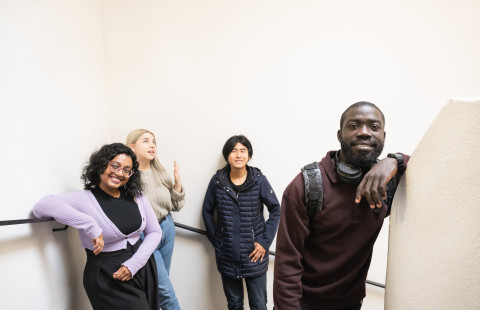 Student smiling in a line