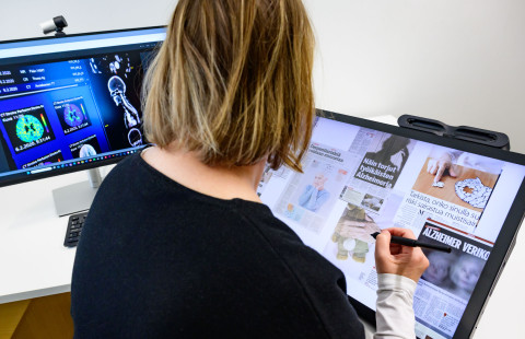 Person looking at a computer screen.