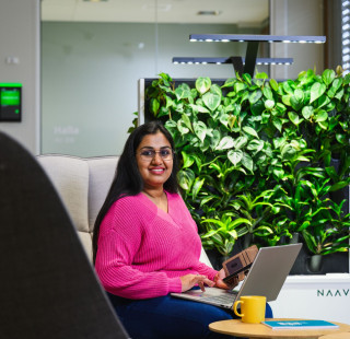 Student typing on laptop