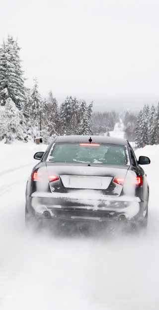 Car on a snowy road.