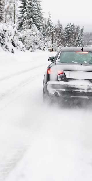 Car on a snowy road.